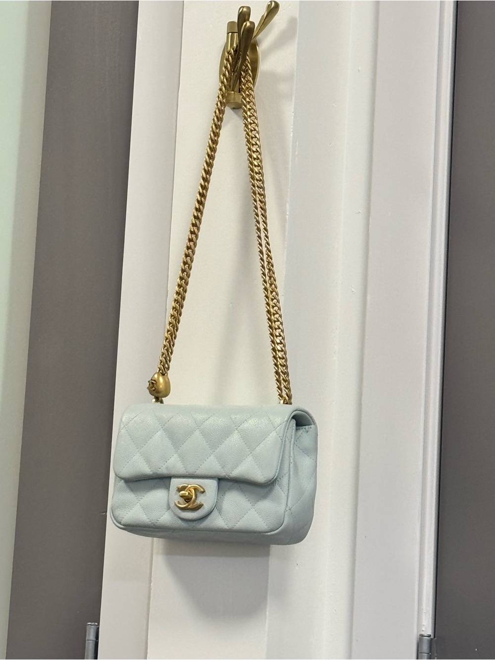 CHANEL- Light Blue Quilted Shoulder Bag with Gold Chain and Heart Crushed